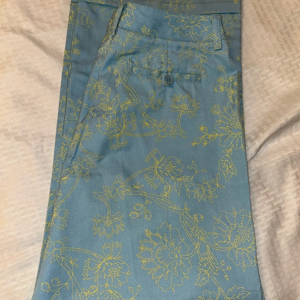 Metro style brand  Light Blue pants with Yellow Floral Design . Super cool